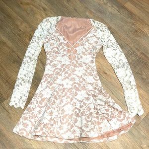 Lovebombed Long sleeve, lace dress has lace-up front, hidden side zipper Small